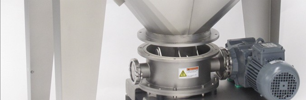 Closeup of Volkmann lump breaker installed at discharge of RNT sack tipping station